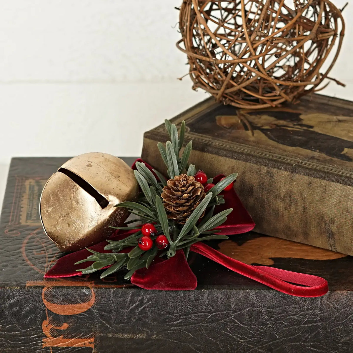 6.5" Long Gold Sleigh Bell with pine and Burgundy Bow